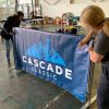 Vinyl barrier banner with bold colors and sponsor graphics