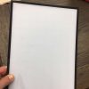 Mini acrylic dry erase board rotated for small space use within gym settings