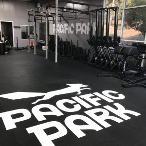 Competition floor signage with branded banner and podium placement