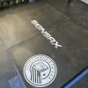 Interlocking weightlifting platform featuring personalized graphics