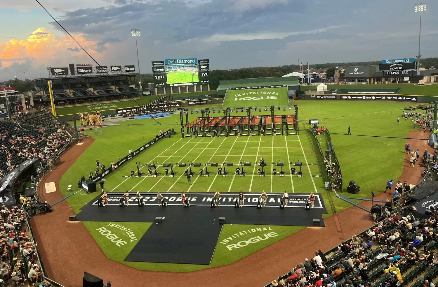 Rogue Invitational signage setup featuring custom graphics and sponsor branding